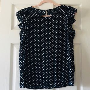 Navy polka dot blouse with ruffle cap sleeves